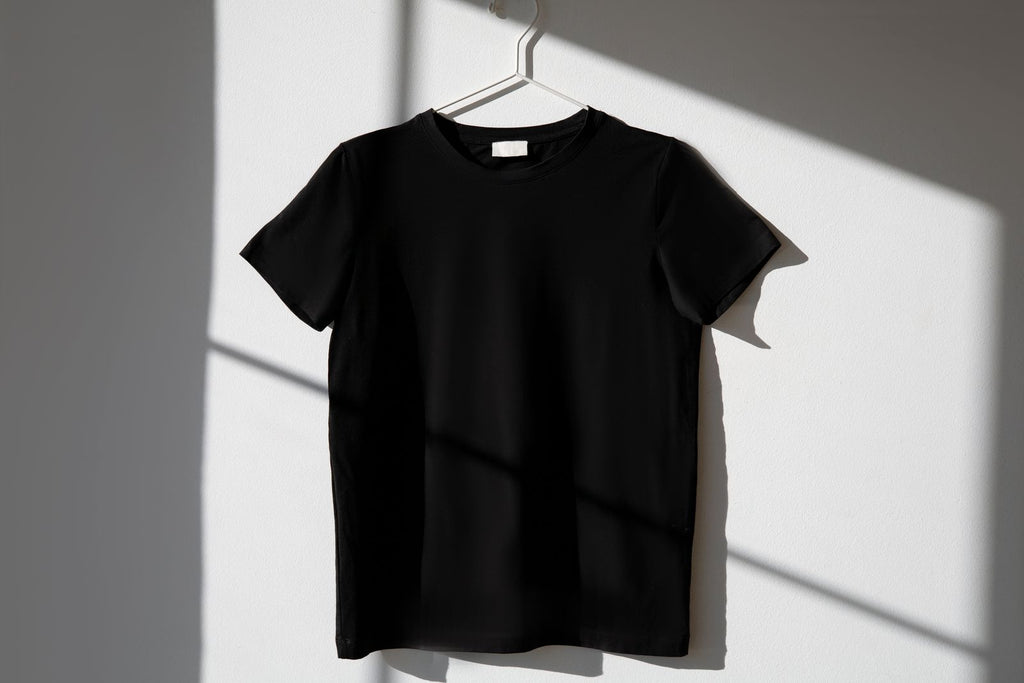 Custom photo t-shirt in black on a hanger — personalized print